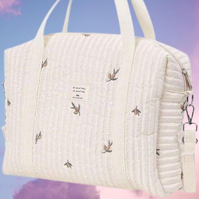 sac a langer beige avec fleurs
