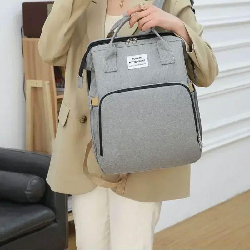 sac a langer gris decontracte