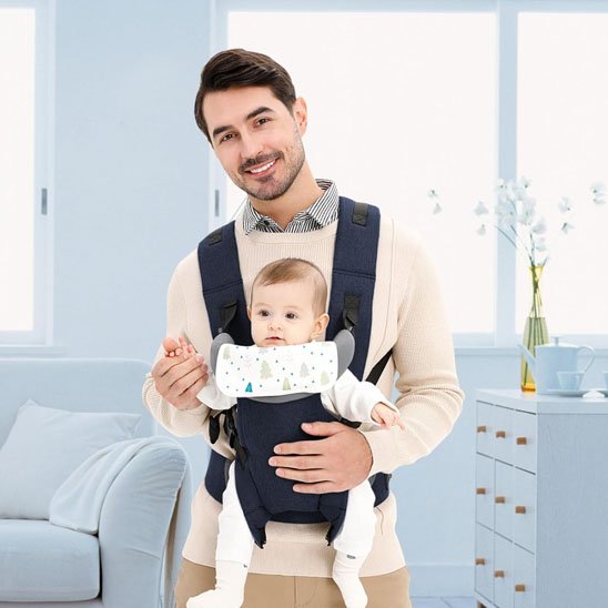 bébé bien content dans Porte bébé